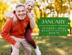 A smiling woman jumping onto the back of a smiling man with text that says ”January: International Quality of Life Month